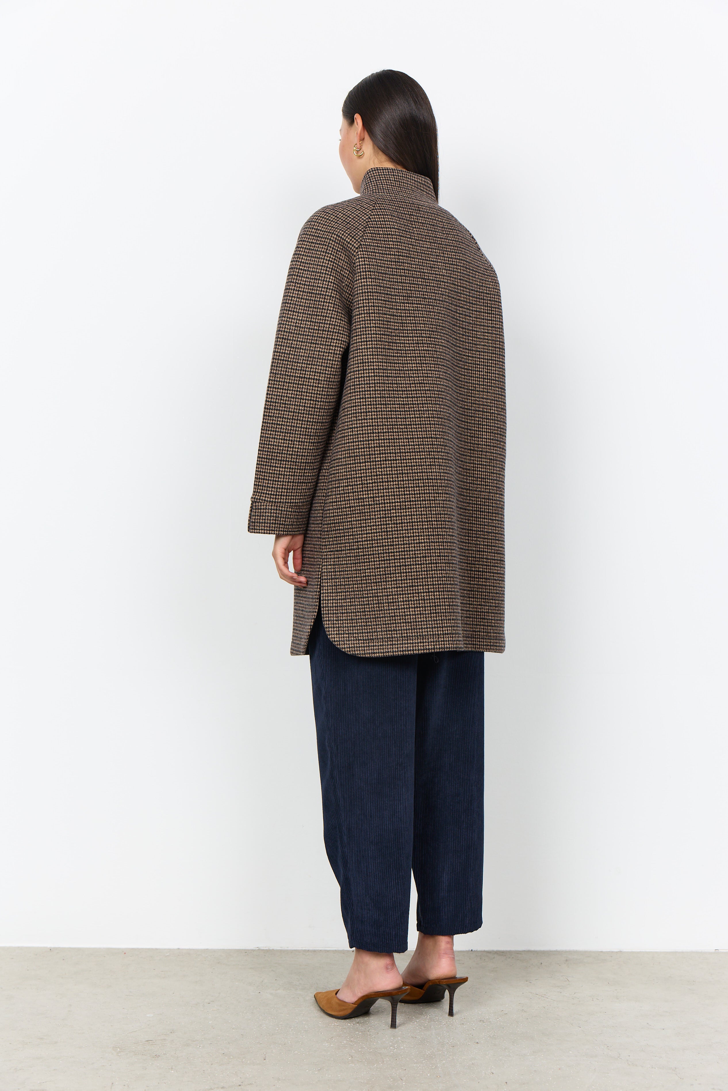 Veste en col avec fermeture à boutons