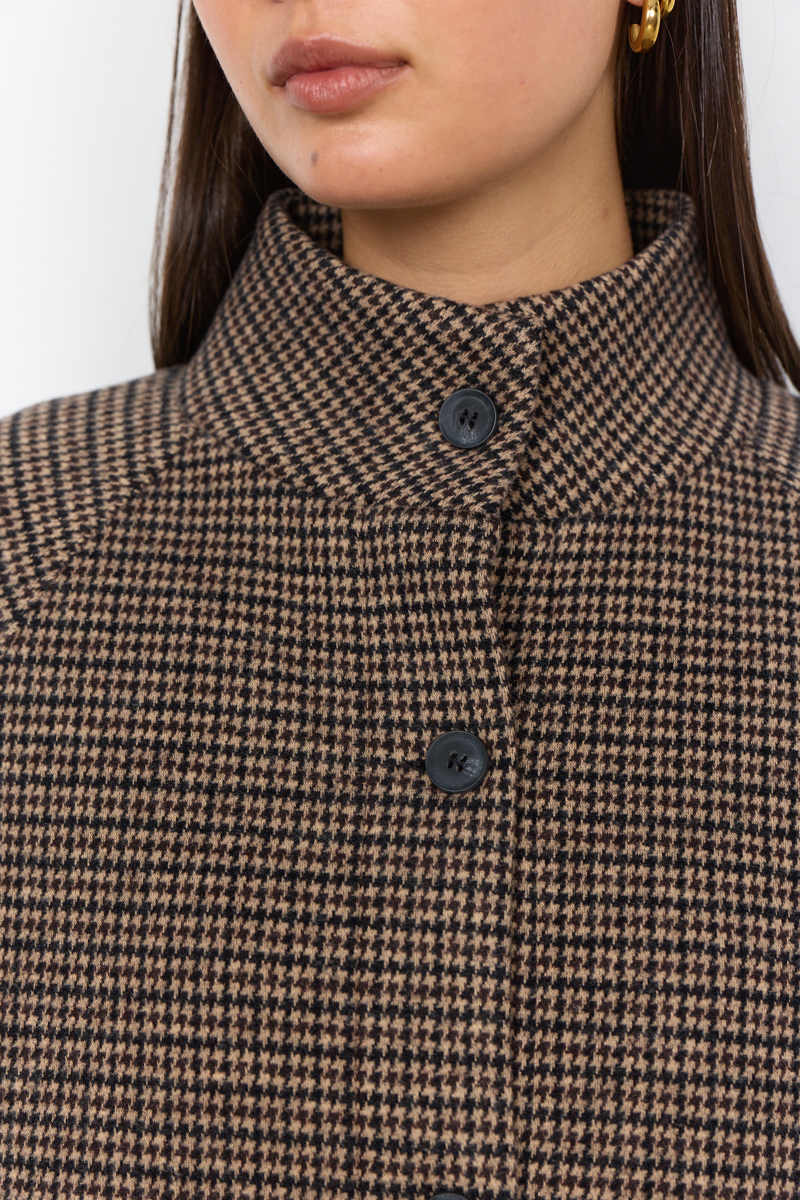 Veste en col avec fermeture à boutons