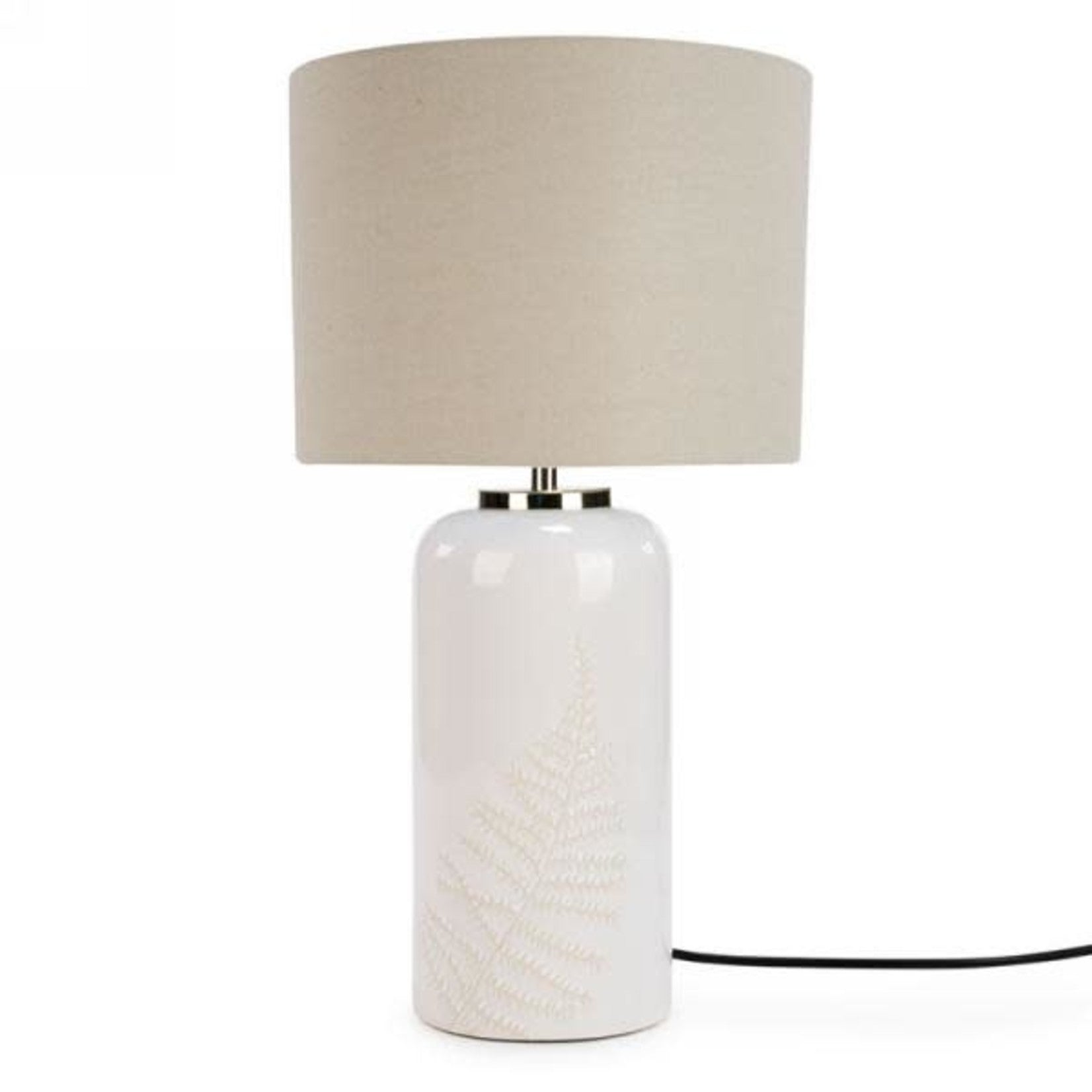 Lampe de table ivoire et beige avec motif de feuillage sur la base.