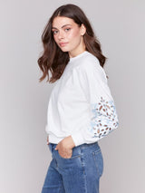 Sweat-shirt avec manches brodées