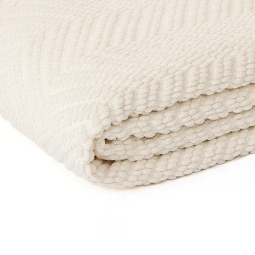 Jeté en chenille ivoire à motif chevron