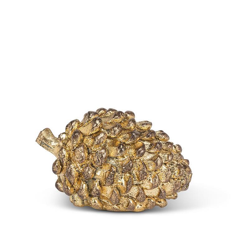 Pomme de pin dorée